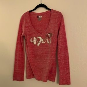 Women’s long sleeve tee.